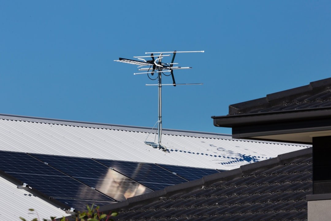 Mastering the First Impression: Your intriguing post title goes here Rooftop solar panels with TV antenna.
